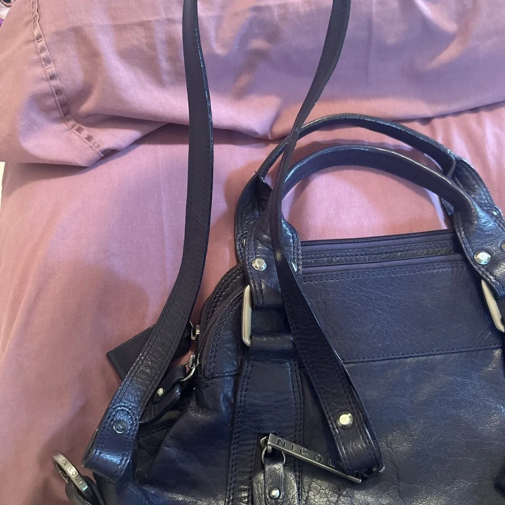 Nicoli Italian leather Large satchel features a dark purplish Blue finish
